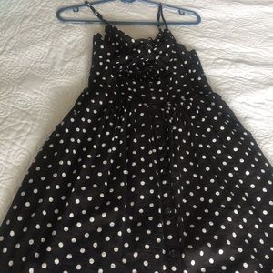 Dress size small black with white polka dots.